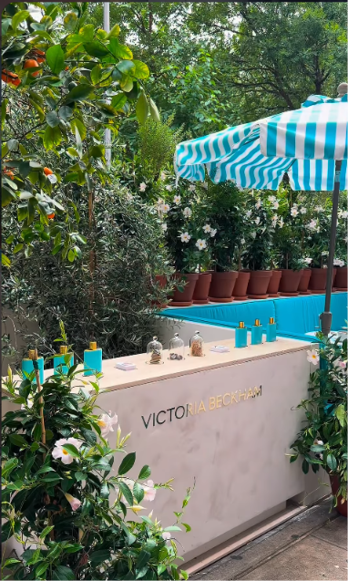 The garden bar at Caffe Paradiso with turquoise striped umbrellas